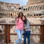 Reese and Courtney from World In Four Days at the Roman Colosseum